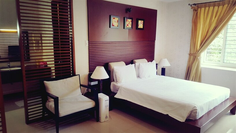 Imagen de la habitación del Hotel Laguna, District 7 - Ho Chi Minh. Foto 15