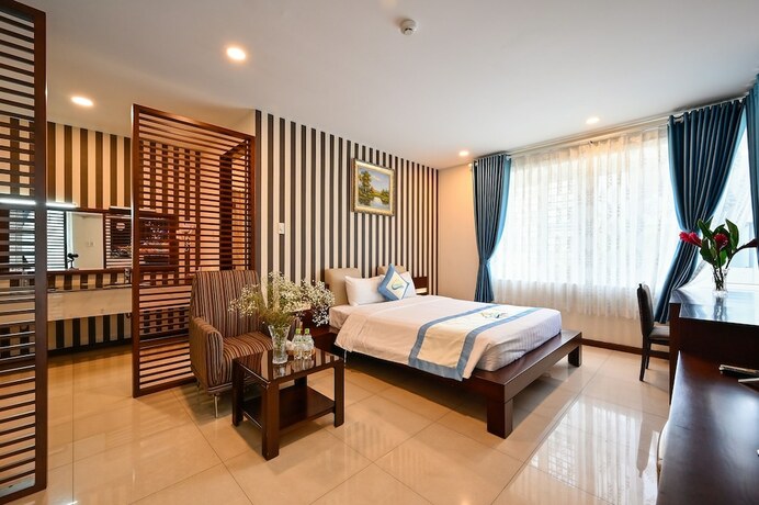 Imagen de la habitación del Hotel Laguna, District 7 - Ho Chi Minh. Foto 17