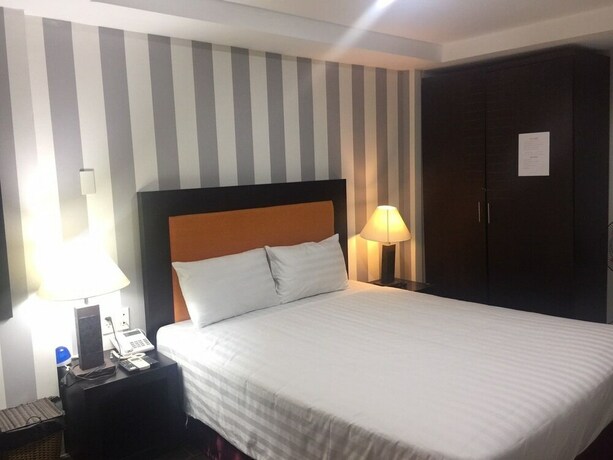 Imagen de la habitación del Hotel Laguna, District 7 - Ho Chi Minh. Foto 22