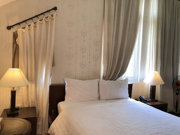 Imagen de la habitación del Hotel Laguna, District 7 - Ho Chi Minh. Foto 23