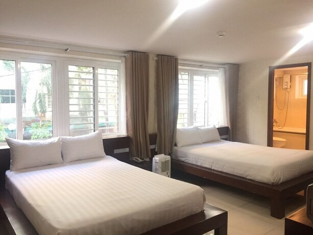 Imagen de la habitación del Hotel Laguna, District 7 - Ho Chi Minh. Foto 27