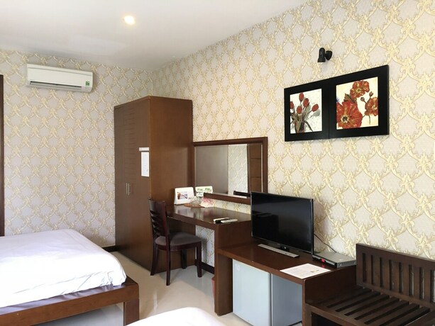 Imagen de la habitación del Hotel Laguna, District 7 - Ho Chi Minh. Foto 29