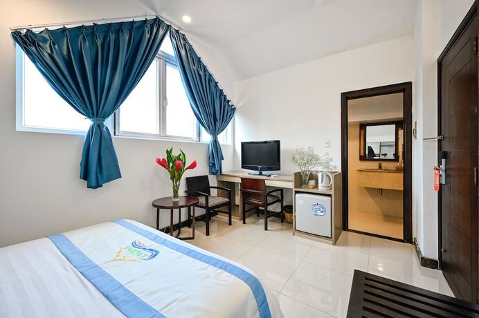 Imagen de la habitación del Hotel Laguna, District 7 - Ho Chi Minh. Foto 31