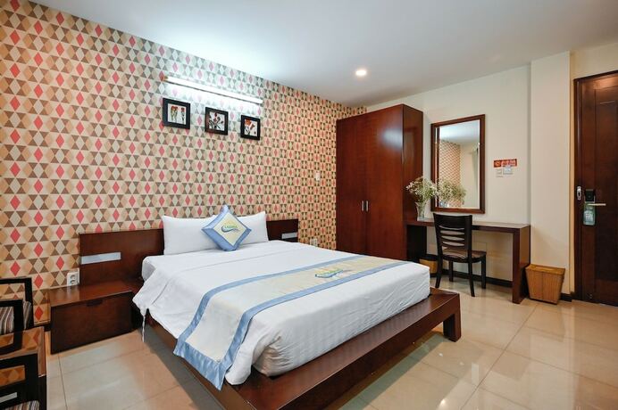 Imagen de la habitación del Hotel Laguna, District 7 - Ho Chi Minh. Foto 35