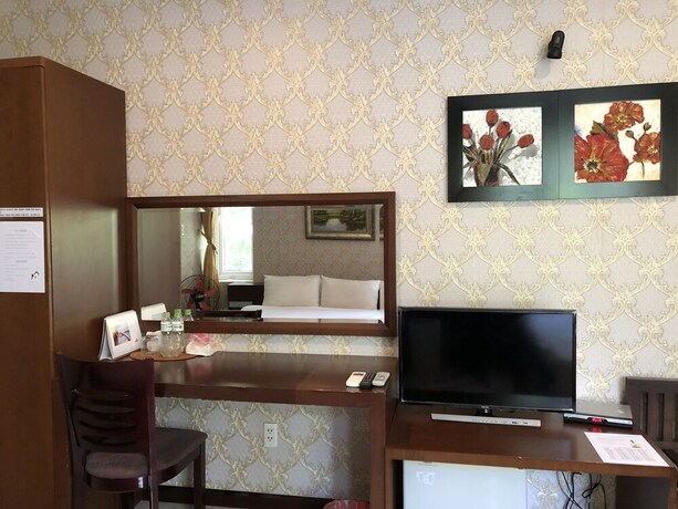 Imagen de la habitación del Hotel Laguna, District 7 - Ho Chi Minh. Foto 37