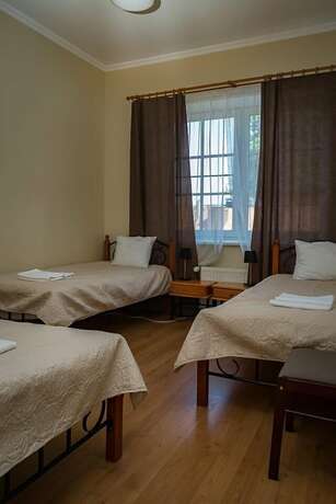 Imagen de la habitación del Hotel Laguna House. Foto 17