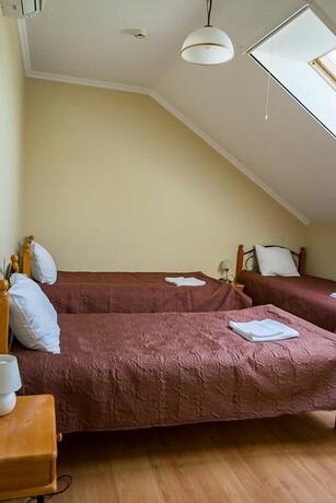 Imagen de la habitación del Hotel Laguna House. Foto 20