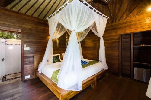 Imagen de la habitación del Hotel Laguna Reef Huts. Foto 8
