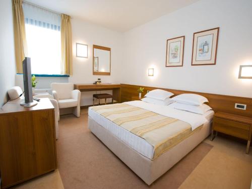 Imagen de la habitación del Hotel Laguna, Zagreb. Foto 2