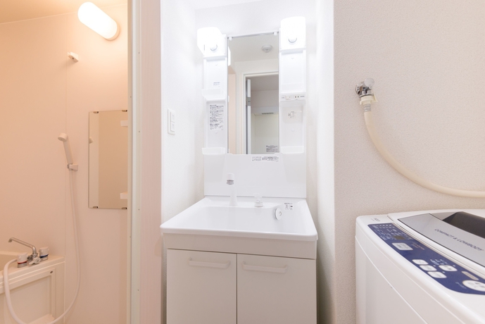 Imagen de la habitación del Hotel Lahaina Yuhigaoka Condominium. Foto 16