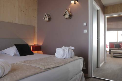 Imagen de la habitación del Hotel L'aiguille Grive Chalets. Foto 3