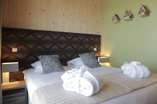 Imagen de la habitación del Hotel L'aiguille Grive Chalets. Foto 4