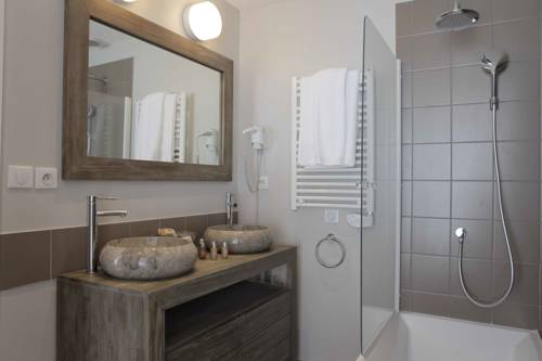 Imagen de la habitación del Hotel L'aiguille Grive Chalets. Foto 5