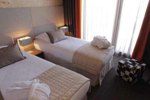 Imagen de la habitación del Hotel L'aiguille Grive Chalets. Foto 6