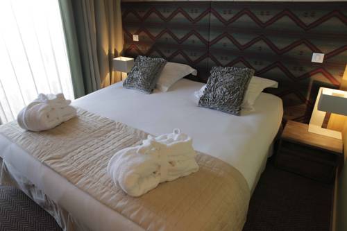 Imagen de la habitación del Hotel L'aiguille Grive Chalets. Foto 15