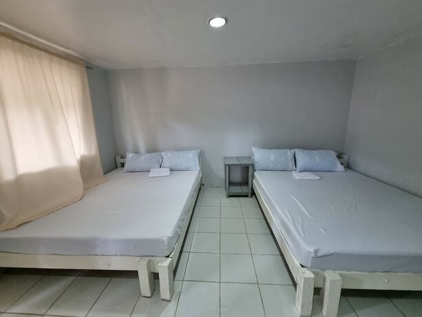 Imagen de la habitación del Hotel Laiya Riviera by Yemaya powered by Cocotel. Foto 11