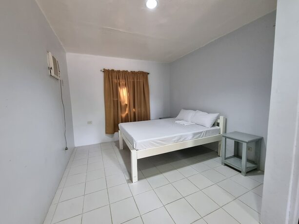 Imagen de la habitación del Hotel Laiya Riviera by Yemaya powered by Cocotel. Foto 15