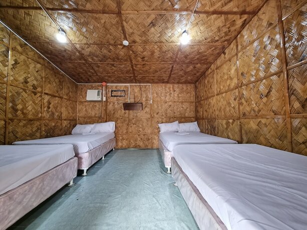 Imagen de la habitación del Hotel Laiya Riviera by Yemaya powered by Cocotel. Foto 18