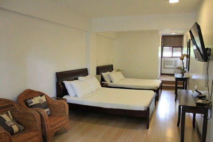 Imagen de la habitación del Hotel Laiya White Cove Beach Resort. Foto 24