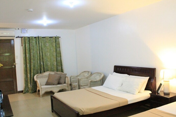 Imagen de la habitación del Hotel Laiya White Cove Beach Resort. Foto 25