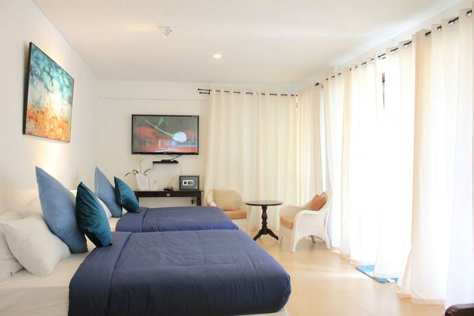 Imagen de la habitación del Hotel Laiya White Cove Beach Resort. Foto 26