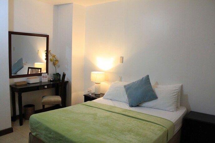 Imagen de la habitación del Hotel Laiya White Cove Beach Resort. Foto 28