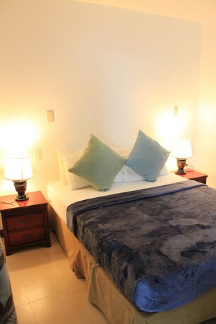 Imagen de la habitación del Hotel Laiya White Cove Beach Resort. Foto 30