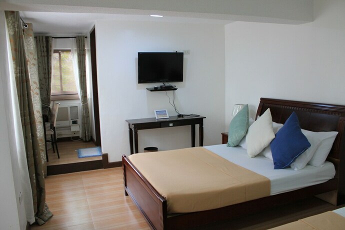 Imagen de la habitación del Hotel Laiya White Cove Beach Resort. Foto 34