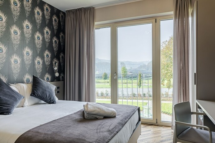 Imagen de la habitación del Hotel L\'aja della Mirusina - Piedmont Resort. Foto 17