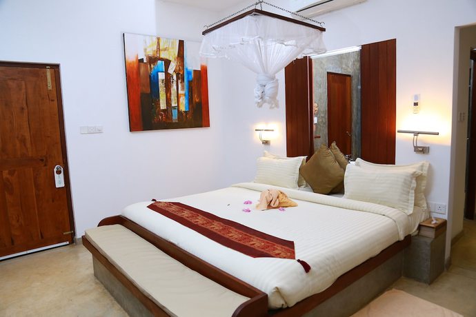 Imagen de la habitación del Hotel Lake Lodge Boutique Kandalama. Foto 7