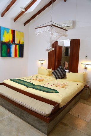 Imagen de la habitación del Hotel Lake Lodge Boutique Kandalama. Foto 10
