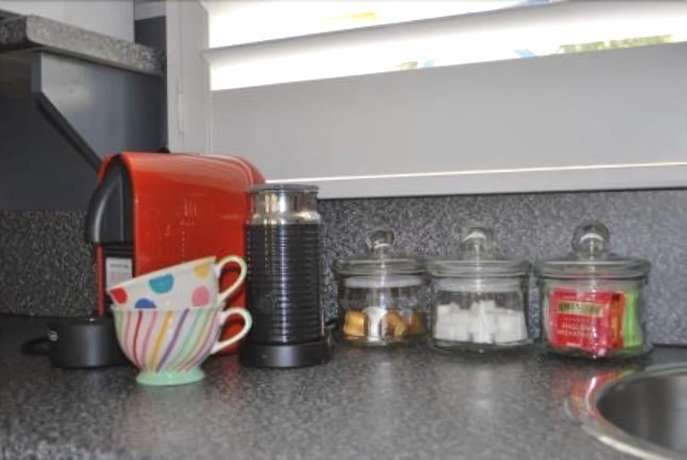 Imagen de la habitación del Hotel Lake Orchard Villas. Foto 7