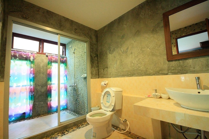 Imagen de la habitación del Hotel Lake Side Bungalow. Foto 11