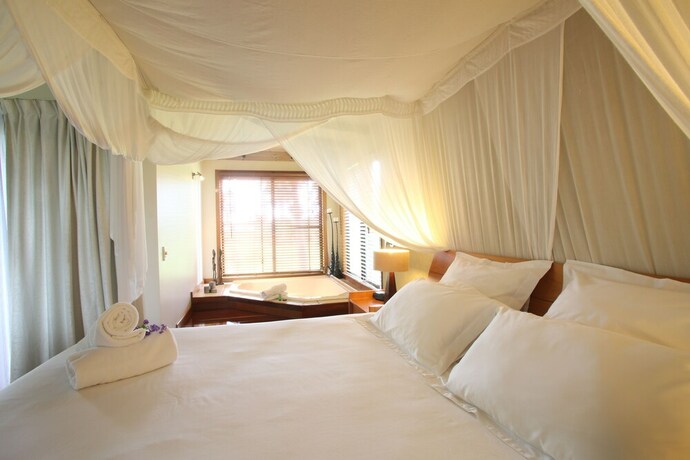 Imagen de la habitación del Hotel Lake Weyba Cottages. Foto 31