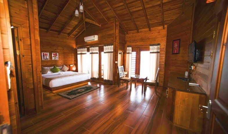 Imagen de la habitación del Hotel LakeRose Wayanad Resort. Foto 11