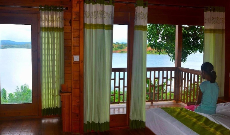 Imagen de la habitación del Hotel LakeRose Wayanad Resort. Foto 12