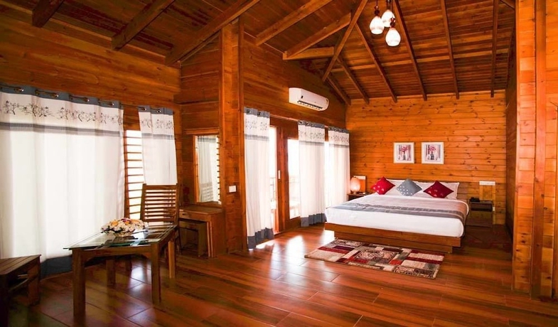 Imagen de la habitación del Hotel LakeRose Wayanad Resort. Foto 13