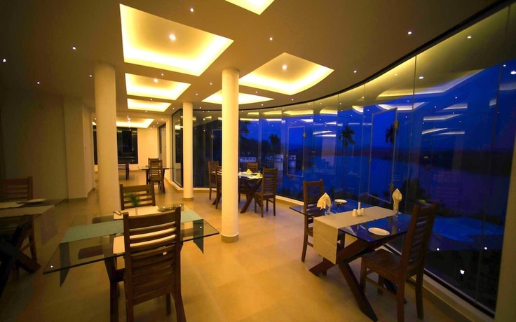 Imagen del bar/restaurante del Hotel LakeRose Wayanad Resort. Foto 2