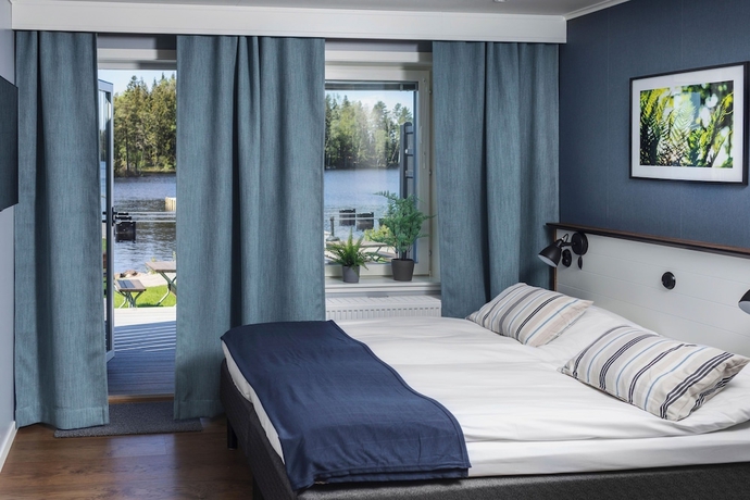 Imagen de la habitación del Hotel Lakelodge. Foto 10