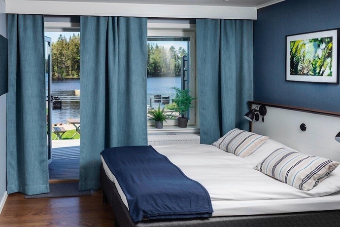 Imagen de la habitación del Hotel Lakelodge. Foto 12