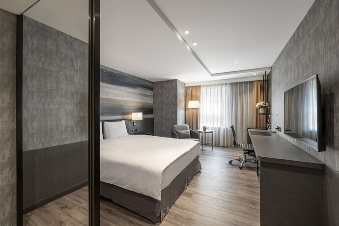 Imagen de la habitación del Hotel Lakeshore Hotel Metropolis. Foto 15