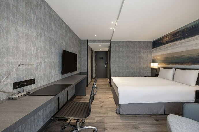 Imagen de la habitación del Hotel Lakeshore Hotel Metropolis. Foto 19