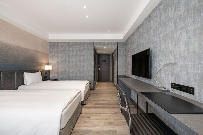 Imagen de la habitación del Hotel Lakeshore Hotel Metropolis. Foto 23