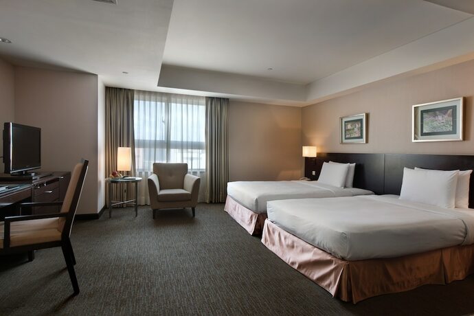 Imagen de la habitación del Hotel Lakeshore Hotel Metropolis. Foto 24