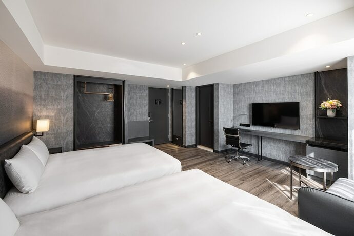 Imagen de la habitación del Hotel Lakeshore Hotel Metropolis. Foto 25