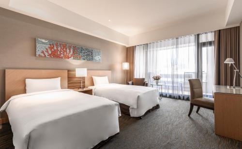 Imagen de la habitación del Hotel Lakeshore Hualien. Foto 6