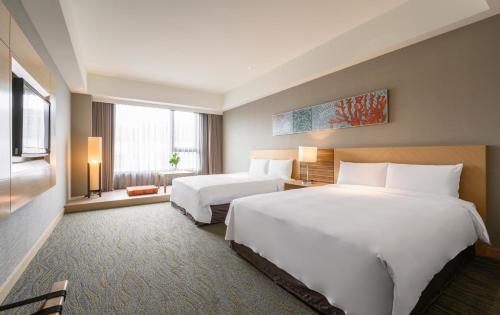 Imagen de la habitación del Hotel Lakeshore Hualien. Foto 8