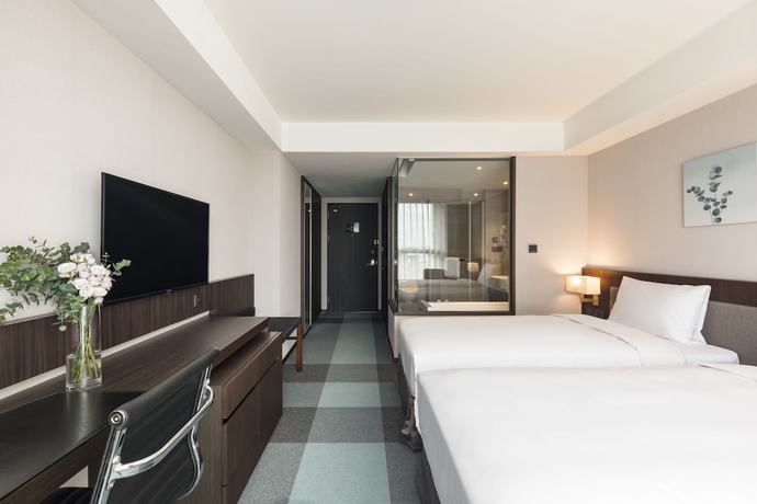 Imagen de la habitación del Hotel Lakeshore Tainan. Foto 9