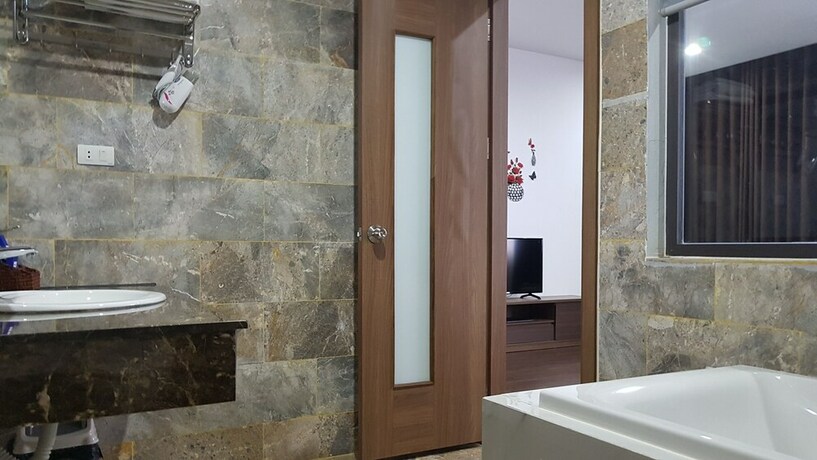 Imagen de la habitación del Hotel Lakeside Dailai. Foto 21