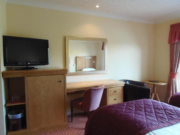 Imagen de la habitación del Hotel Lakeside International. Foto 5